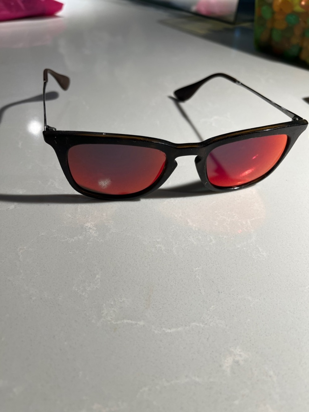 Ray-Ban Black Frame Sunglasses with Red Mirrored Lenses
